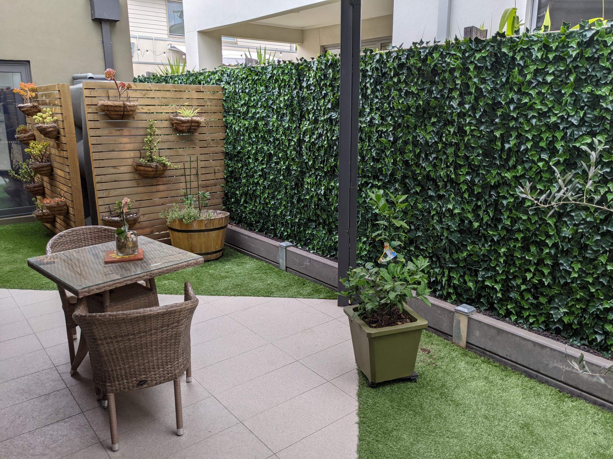 Artificial Ivy Panels onto a fence