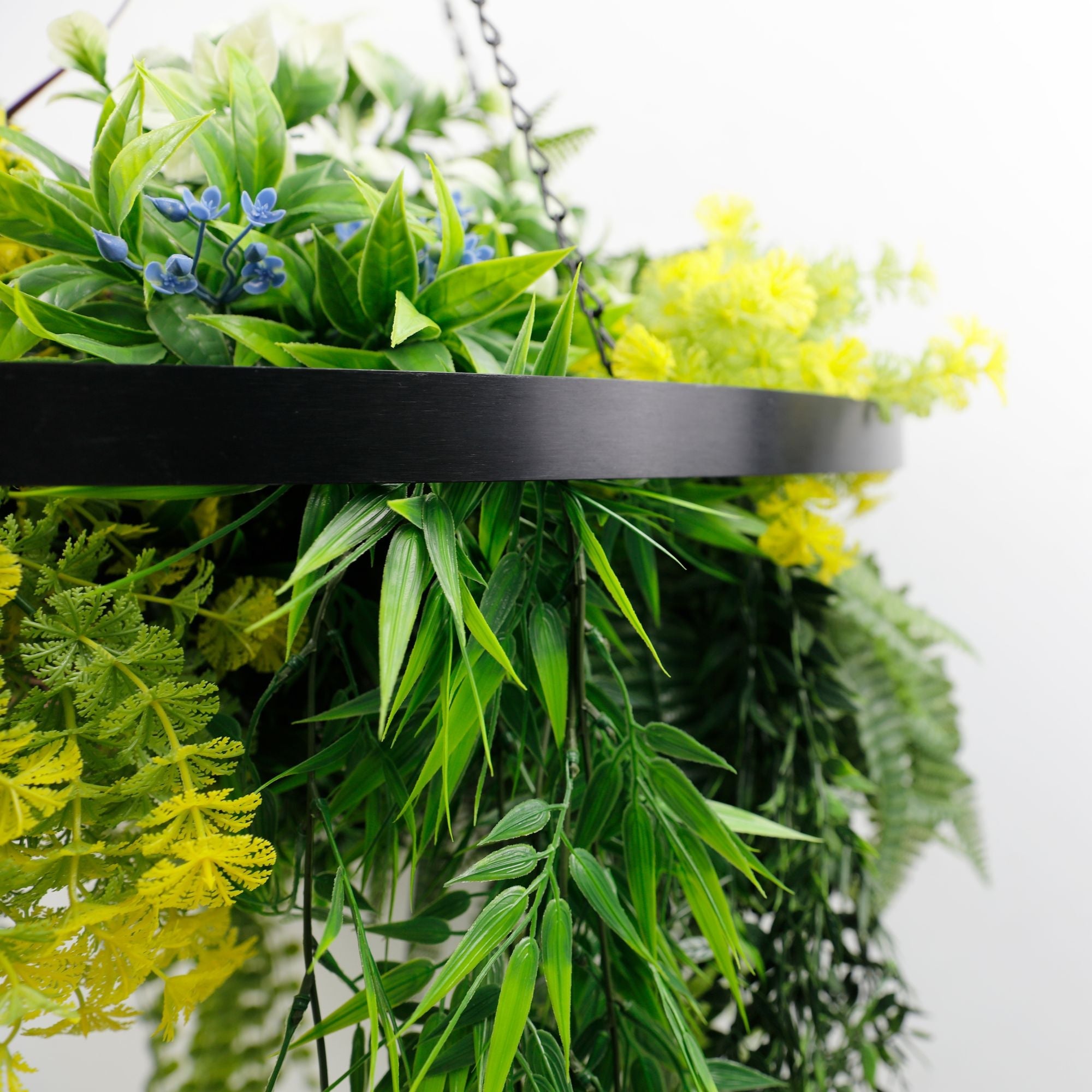 Black Framed Roof Hanging Disc With Tropical Foliage Mix and Draping Stems UV Resistant Medium