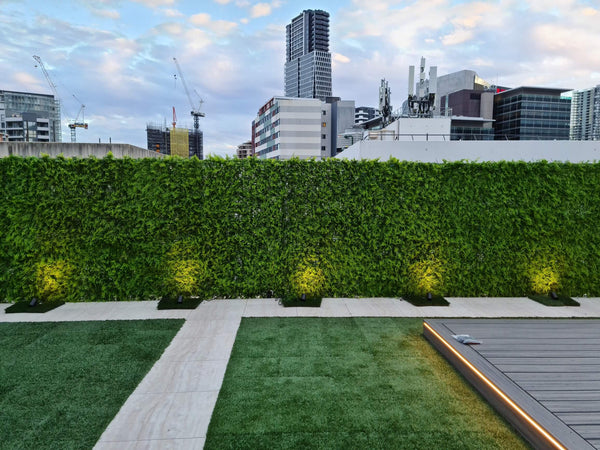 Green walls on the exterior of an apartment building