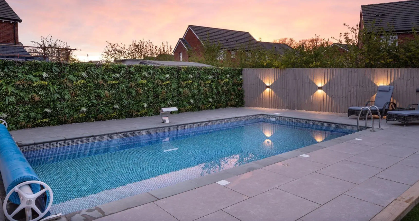Swimming Pool with wild tropics living wall panel and yellow flowers added in