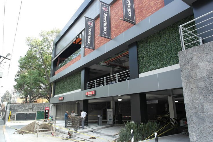 Artificial Laurel Hedge Panels on a Commercial Car Park