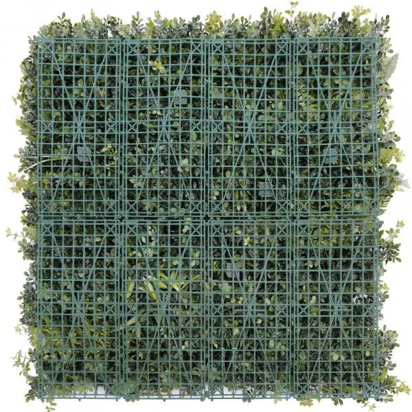 backing of faux fern plant wall panel
